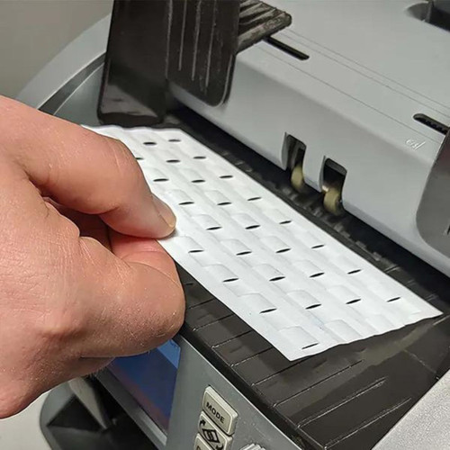 Guide into rollers